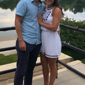 White romper with embroidered navy blue detail! Size small